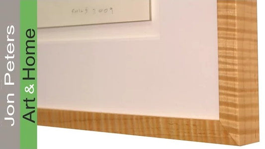 I found a nice piece of curly maple at Lowes and made a frame
