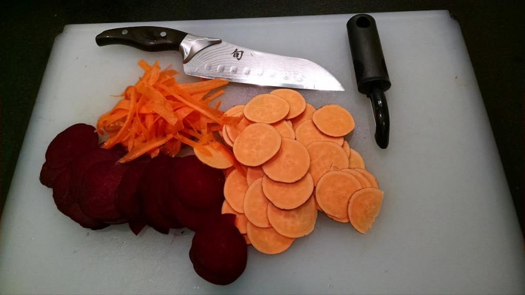Thinly sliced beets and sweet potatoes and a nice pile of carrot ribbons...ready for oven-crisping