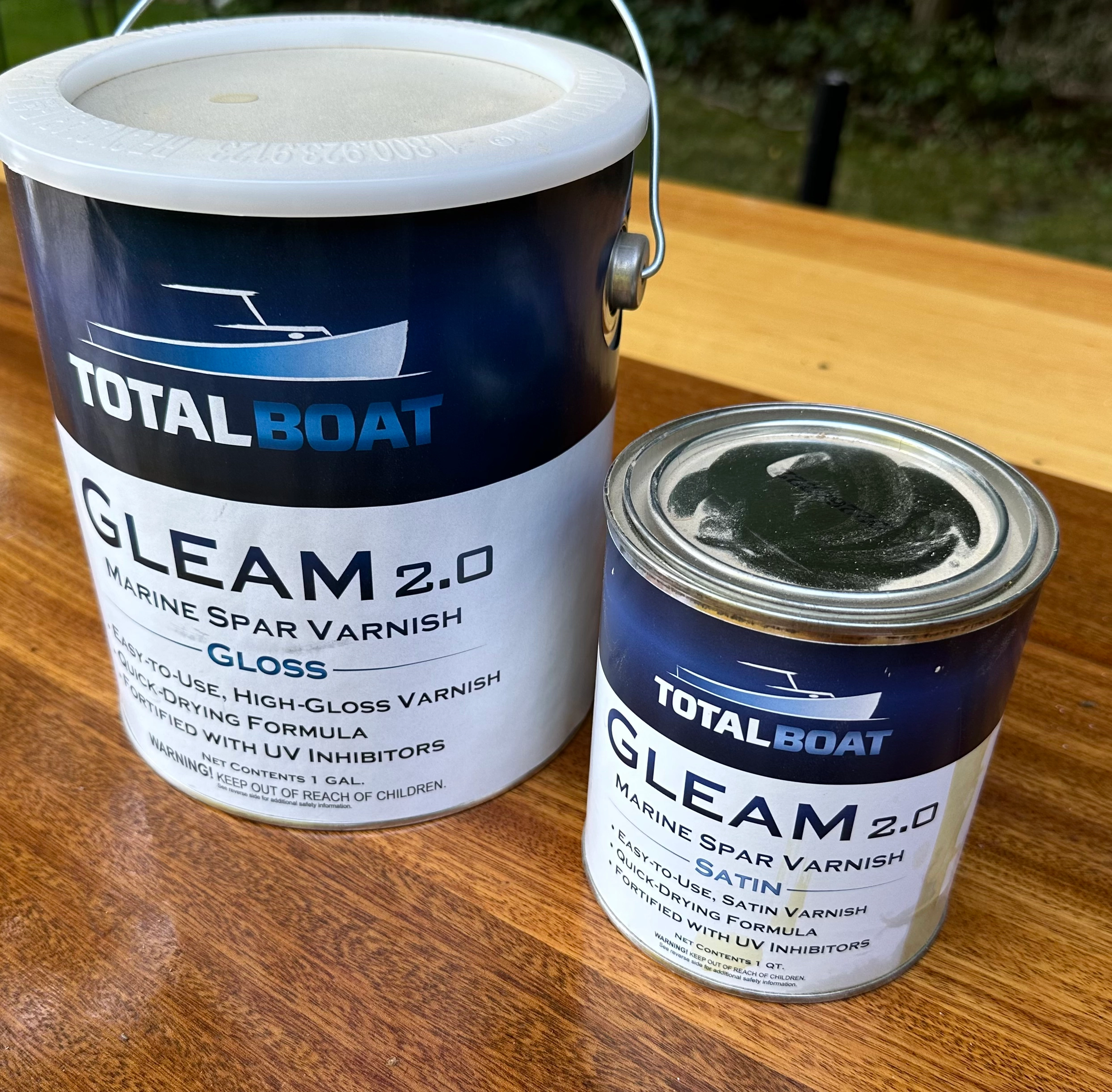 Two cans of gleam 2.0 gloss and satin from TotalBoat